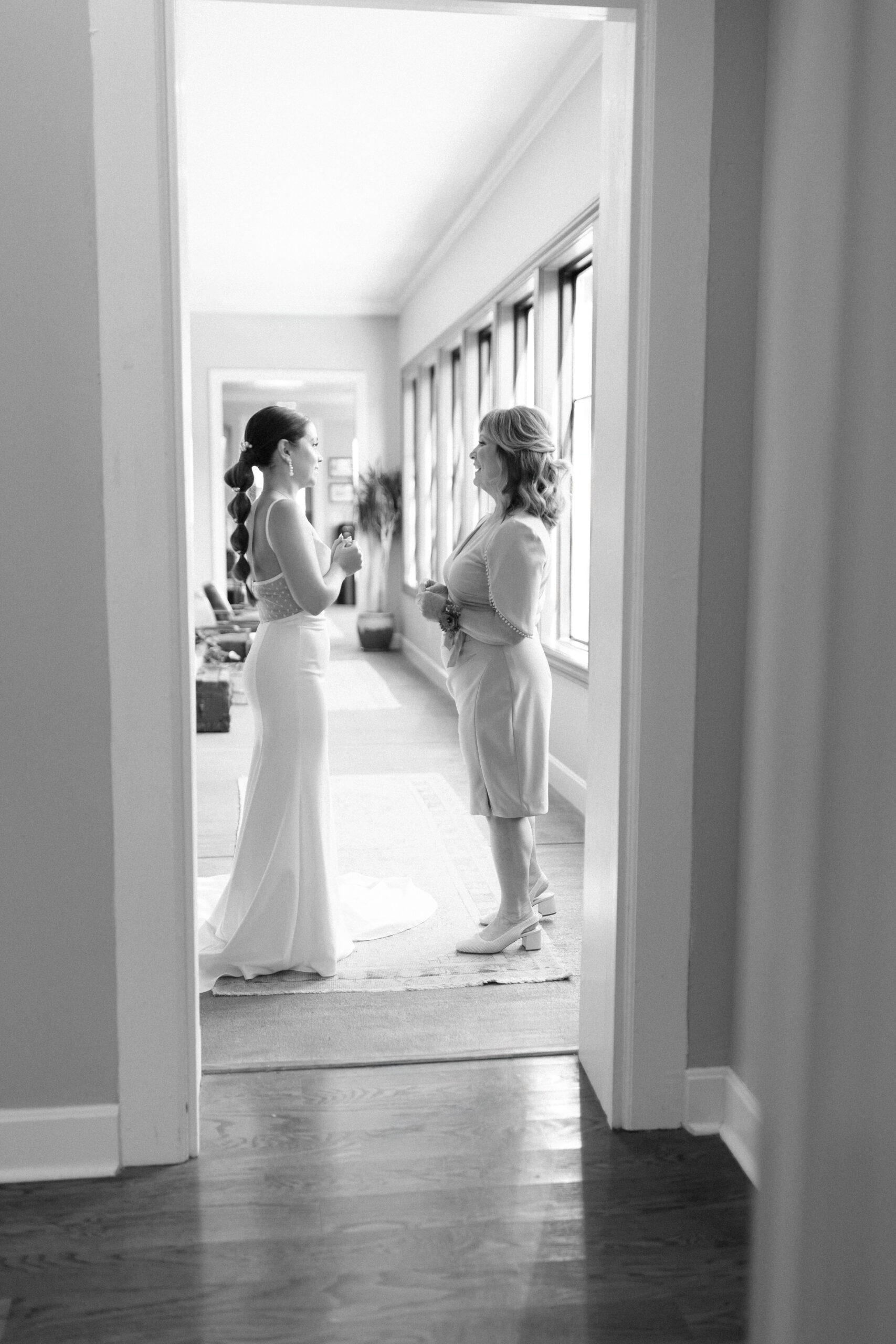 The bride having moment with her mom. 